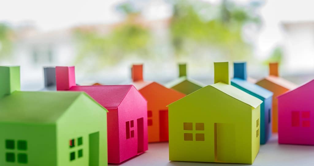 Different colored blocks shaped as houses