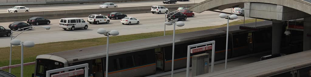 A MARTA train running alongside Georgia 400
